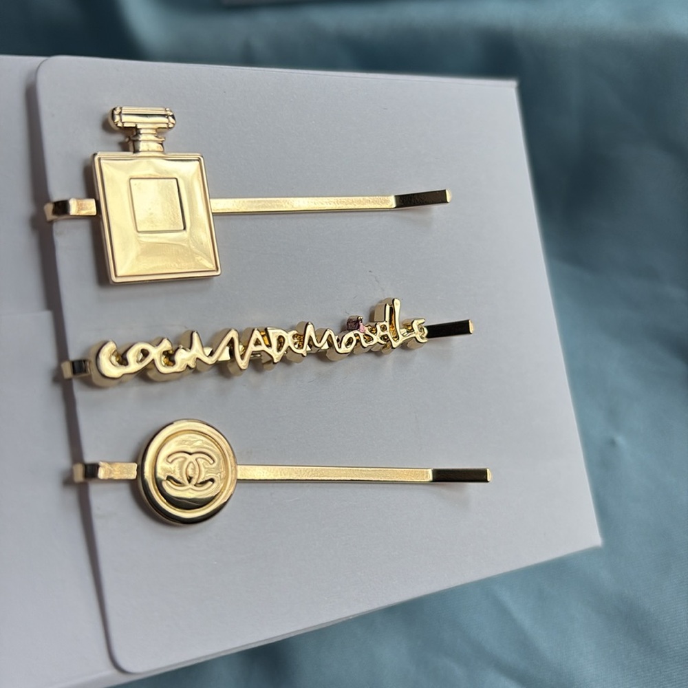 CHANEL -  gold plated gorgeous hair clips- classic designer luxury tie- ownable!